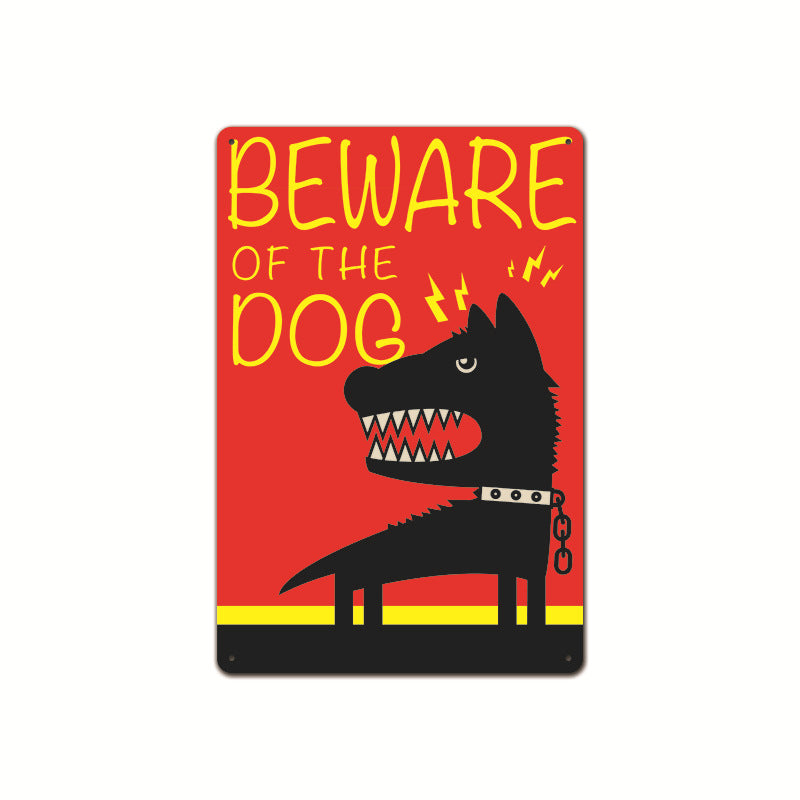 Painted iron garden warning signs featuring a cartoonish 'Beware of the Dog' design in vibrant colors.