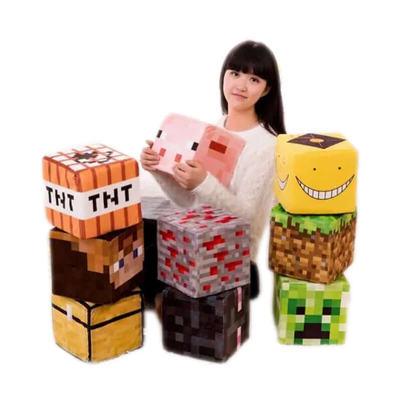 Girl holding a Minecraft TNT block plush stool among other Minecraft plush toys, showcasing gaming decor and comfort.