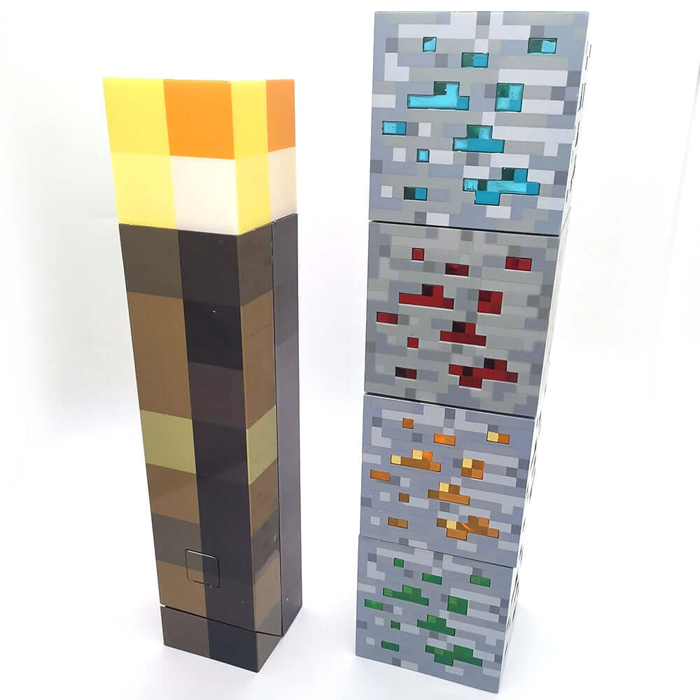 Minecraft Color Changing Sword Pickaxe Toy Lamp beside colorful block toys.