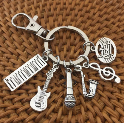 Music Keychain with Piano Guitar Saxophone Design