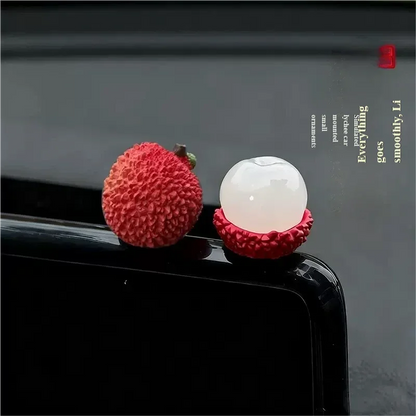 Personalized and creative cartoon car decorations on the center console, simulating orange and lychee car decorations