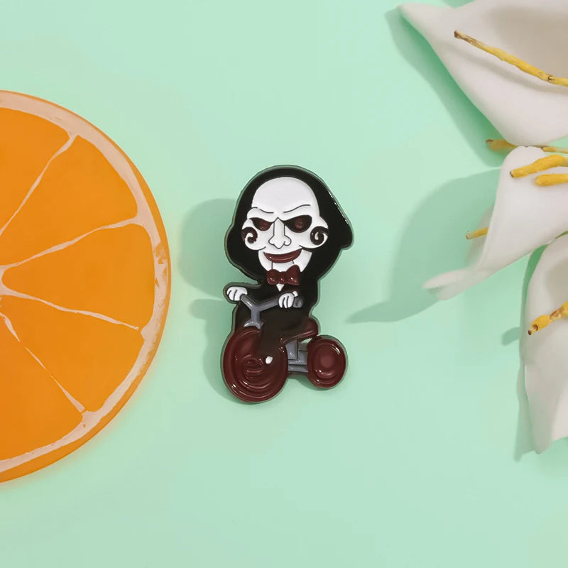 Horror Movie Jigsaw Billy Mechanical Puppet Enamel Pin Clown On Bicycle Halloween Brooch Lapel Badge Jewelry Gift For Friends