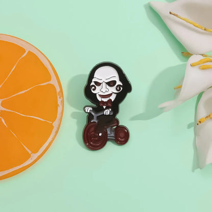 Horror Movie Jigsaw Billy Mechanical Puppet Enamel Pin Clown On Bicycle Halloween Brooch Lapel Badge Jewelry Gift For Friends