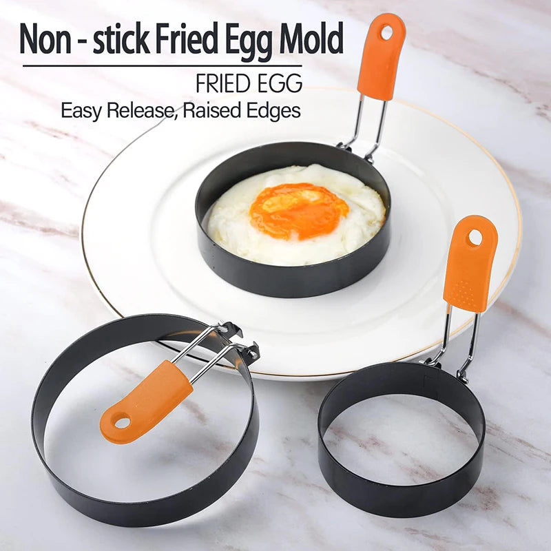 Non-stick fried egg mold featuring a stainless steel egg ring with silicone handle for easy release and perfectly round eggs.