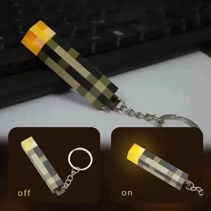 /2026 New World Torch Light Torch Can Shine Keychain Mini Model Pendant Toy Most Popular Festival Mode