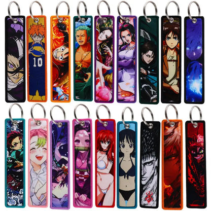 Anime key fob accessories featuring popular characters from various anime series in a colorful keychain collection.