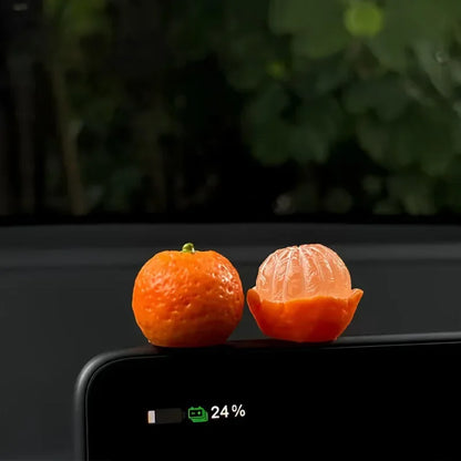 Personalized and creative cartoon car decorations on the center console, simulating orange and lychee car decorations