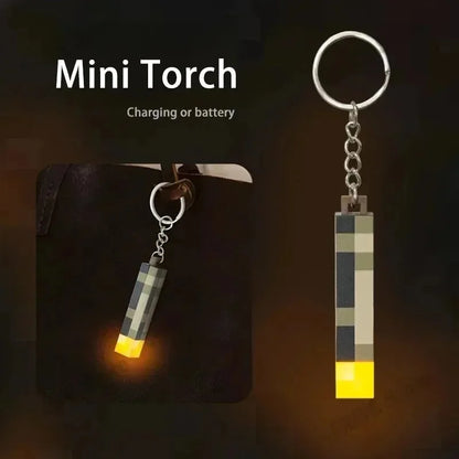 /2026 New World Torch Light Torch Can Shine Keychain Mini Model Pendant Toy Most Popular Festival Mode