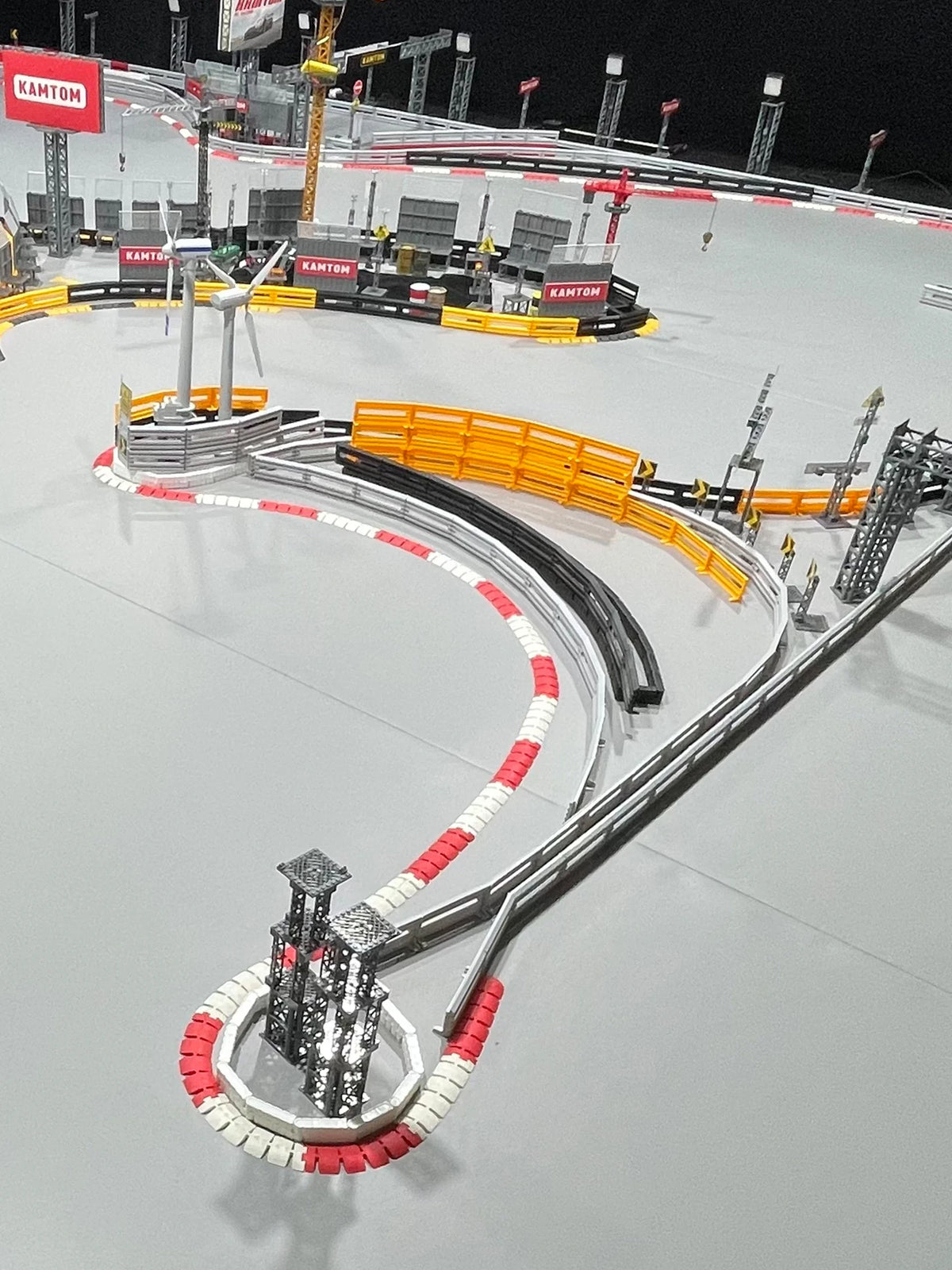 DIY remote control car race barriers arrangement with tracks and roadblocks for racing.