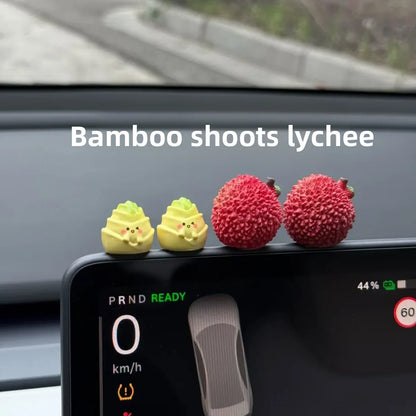 Personalized and creative cartoon car decorations on the center console, simulating orange and lychee car decorations