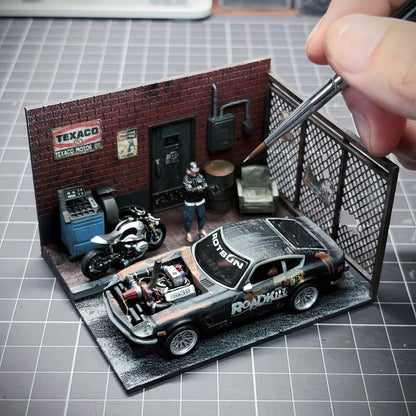 1:64 Miniature building scene model with car and motorcycle in a back alley setting.