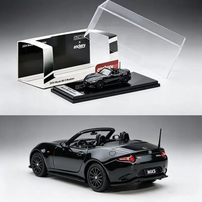 1:64 Mazda MX-5 RF diecast car model displayed in a clear case with black sports car design.