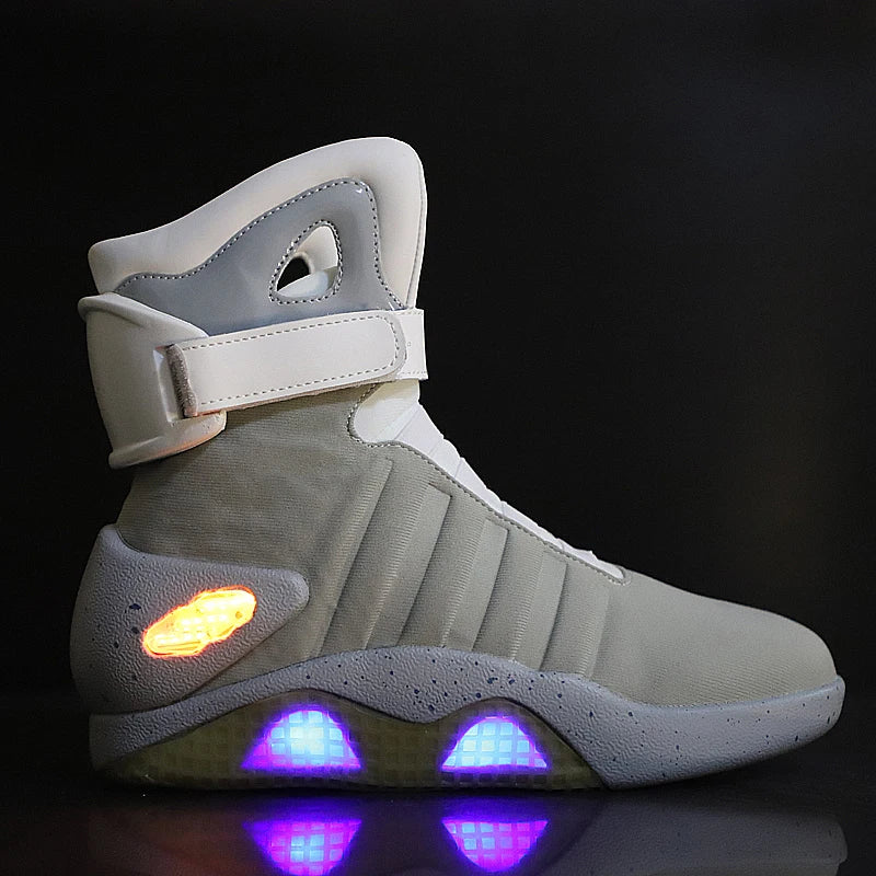 led skateboarding shoes for men and women with glowing blue lights and stylish design.