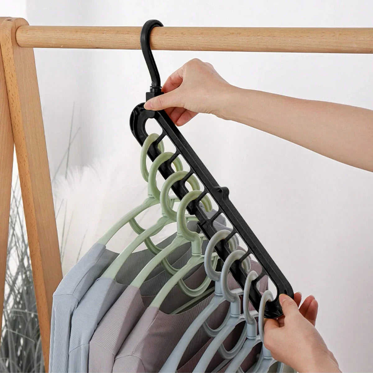 1pc - Nine hole multifunctional magic folding clothes hanger, convenient storage and space saving storage cabinet