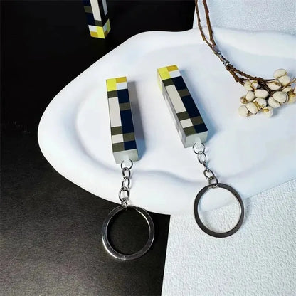 /2026 New World Torch Light Torch Can Shine Keychain Mini Model Pendant Toy Most Popular Festival Mode