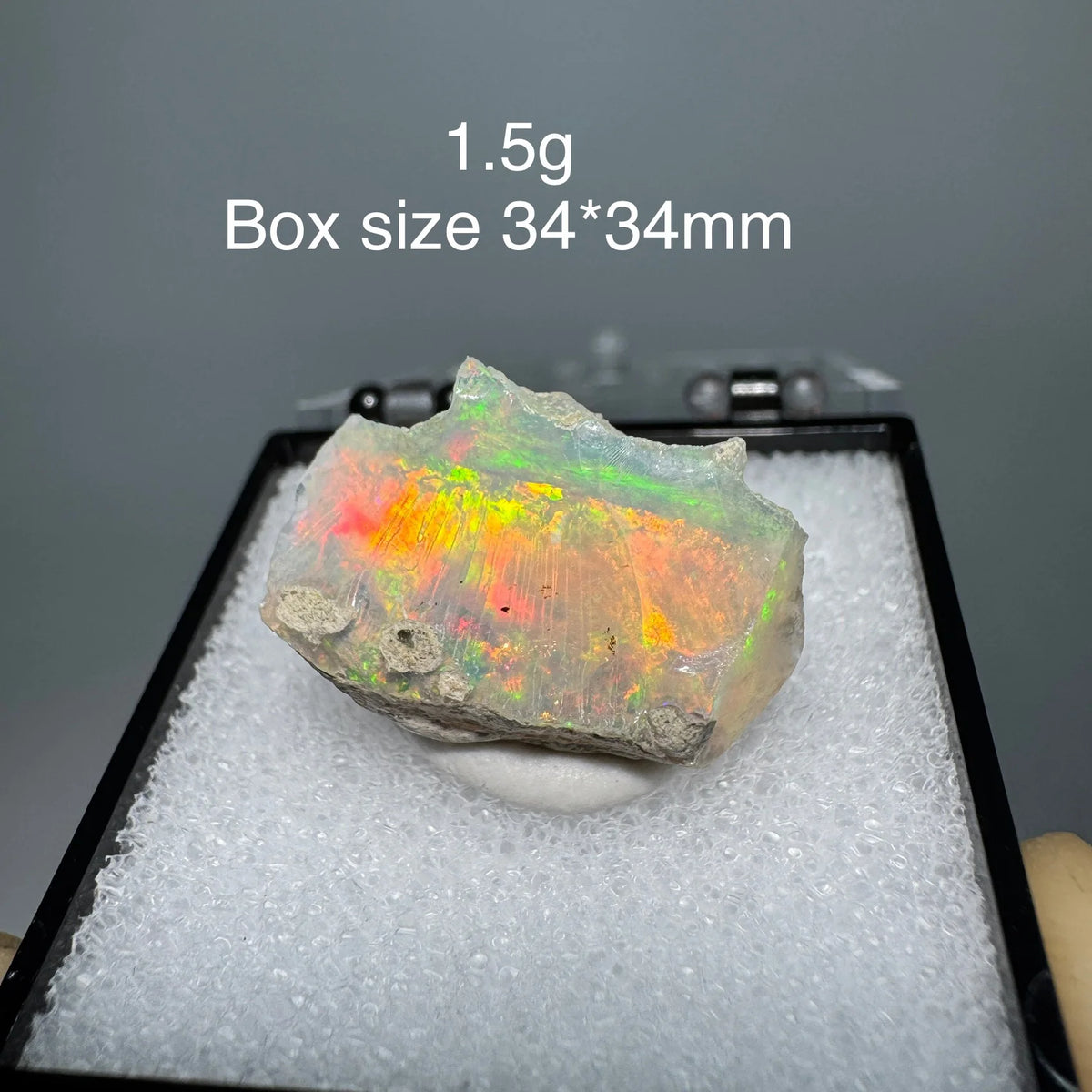 Natural rare colorful Ethiopia opal mineral specimen, 34X34mm box size, vibrant colors best in sunlight.
