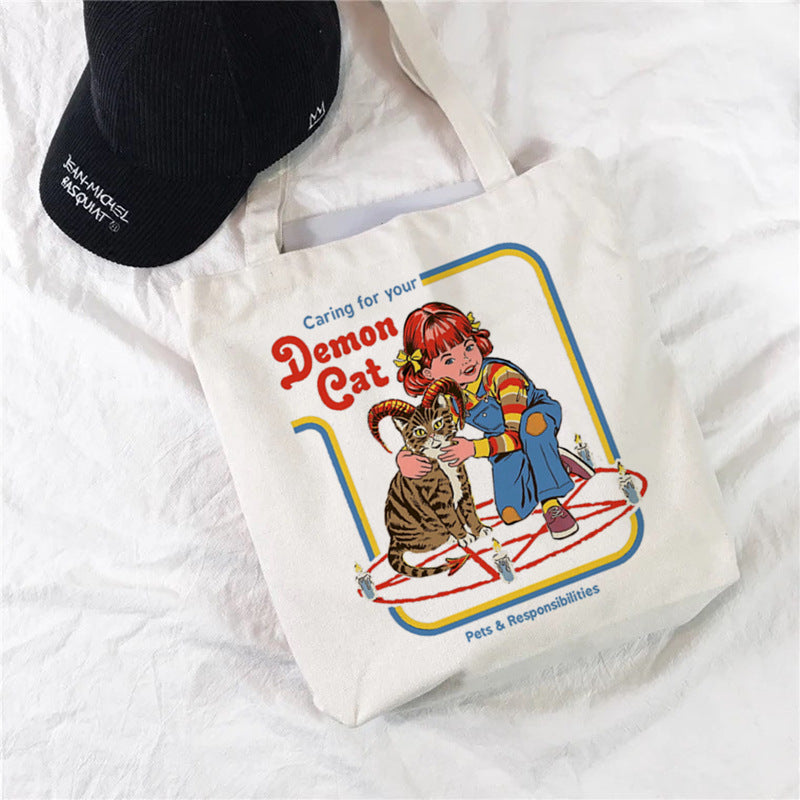 Caring for your Demon Cat printed on personalized canvas shopping bag, ideal for pet lovers and shopping.