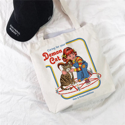Caring for your Demon Cat printed on personalized canvas shopping bag, ideal for pet lovers and shopping.